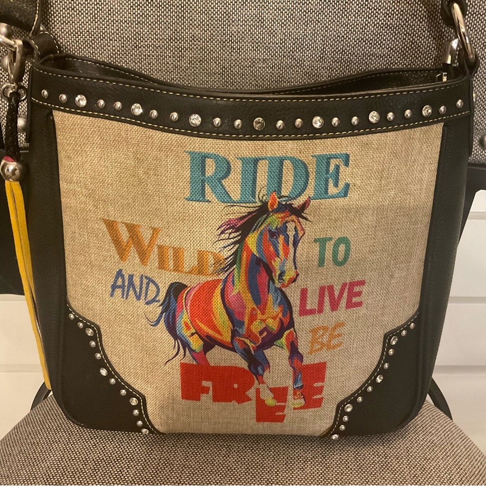 Montana West never used leather purse with concealed carry pouch.